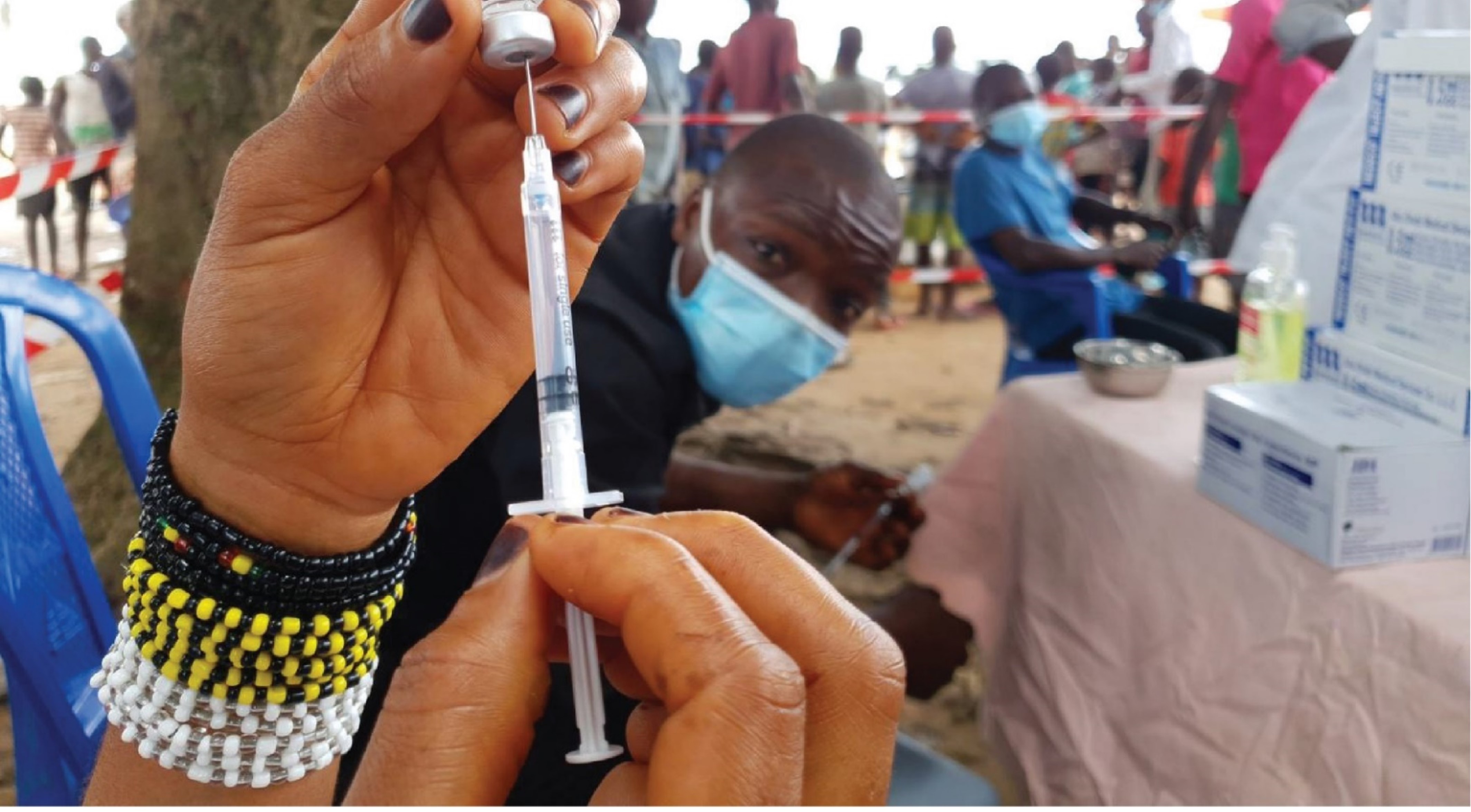 Preparing a shot with MenAfriVac Vaccine (Credit: WHO/AFRO)