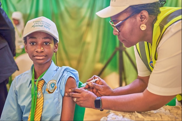 Girl in Nigeria getting vaccinated for HPV